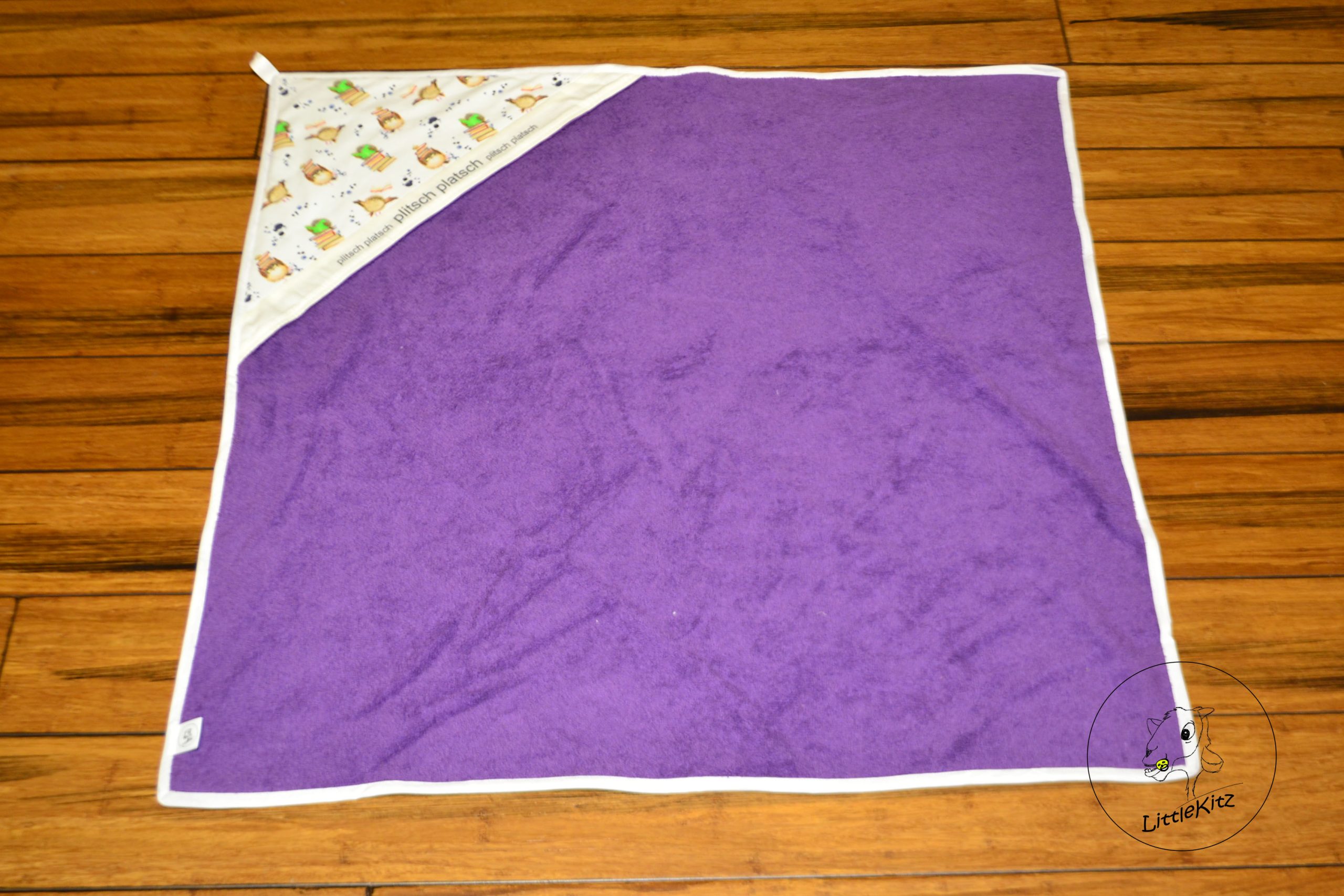 Badetuch Plitsch Platsch lila